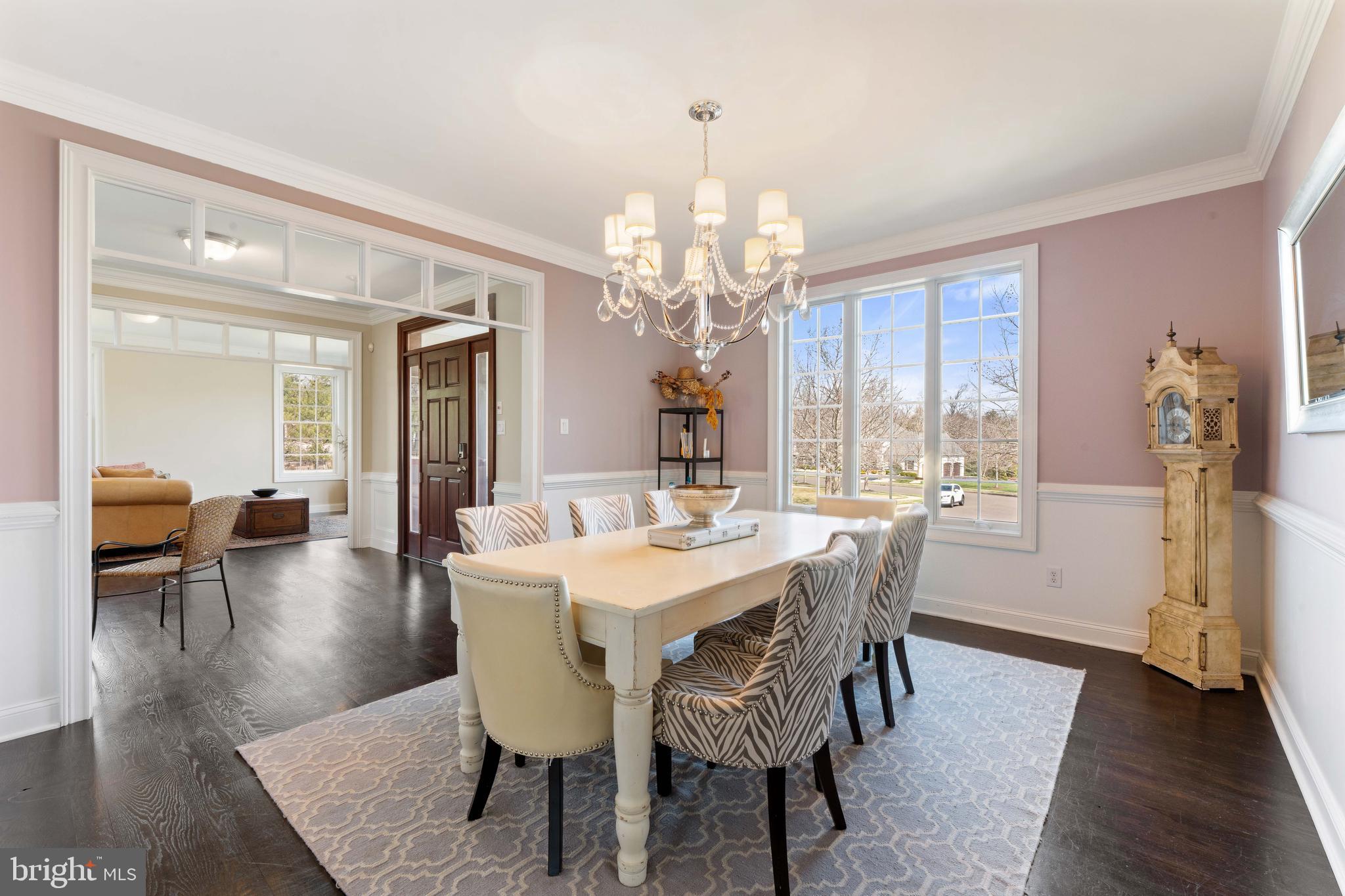 8 Quartermaster Road Feasterville-Trevose, PA 19053 - Photo 5 of 60 a view of a dining room with furniture wooden floor and chandelier