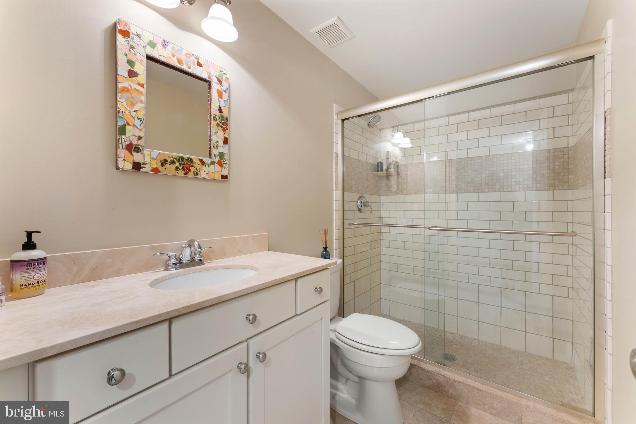 8 Quartermaster Road Feasterville-Trevose, PA 19053 - Photo 53 of 60 a bathroom with a sink a toilet and shower