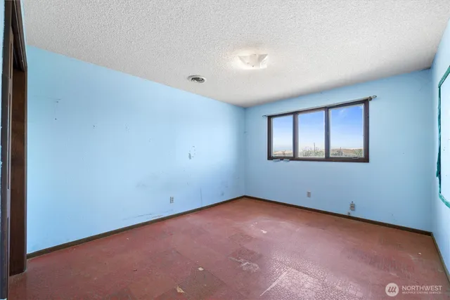 an empty room with closet