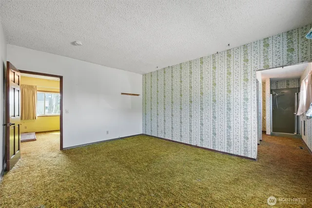 a view of a swimming pool with a lounge chair