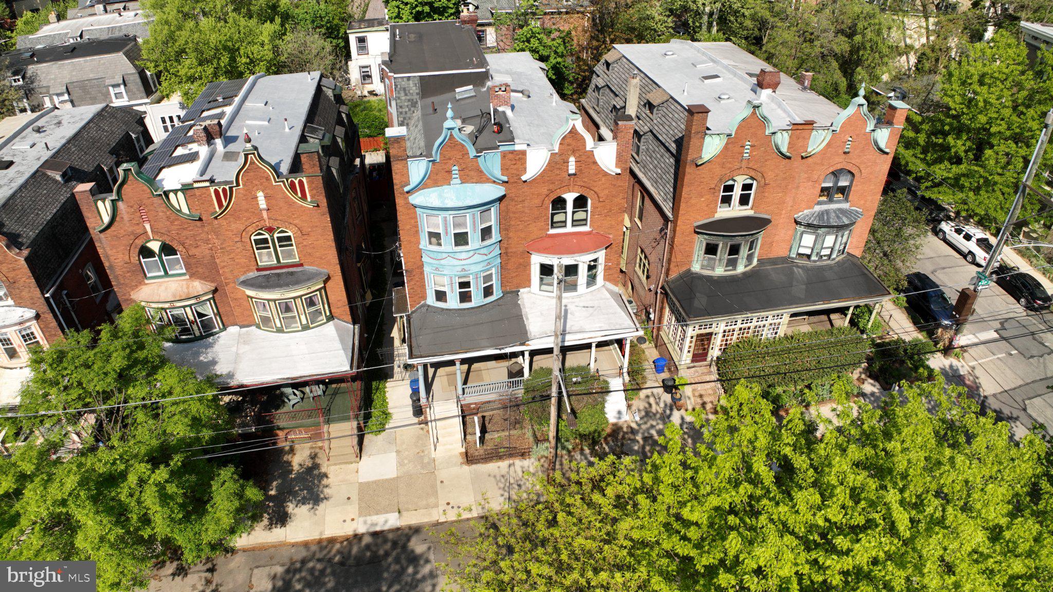 426 South 44th Street, Unit 1 Philadelphia, PA 19104 - Photo 1 of 10 an aerial view of residential houses with outdoor space and parking