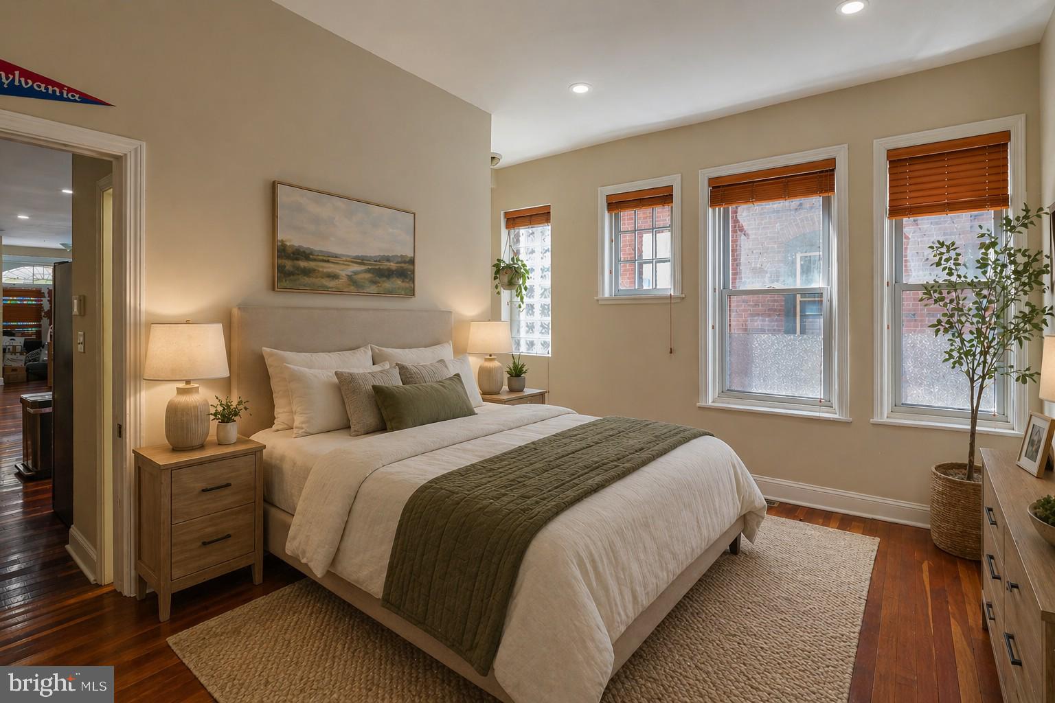 426 South 44th Street, Unit 1 Philadelphia, PA 19104 - Photo 5 of 10 a bedroom with bed and window