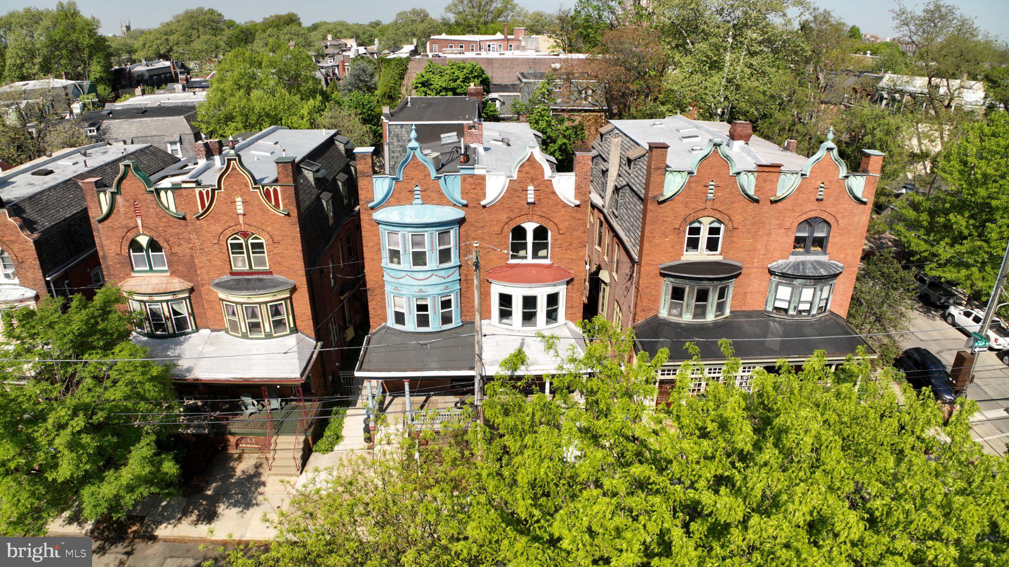 426 South 44th Street, Unit 1 Philadelphia, PA 19104 - Photo 8 of 10 an aerial view of residential houses with outdoor space and parking