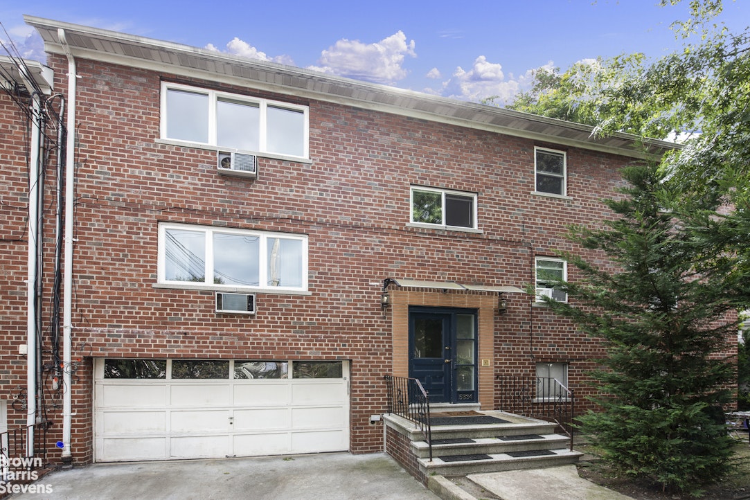 5834 Fieldston Road Bronx, NY 10471 - Photo 14 of 15 a front view of a house with a yard
