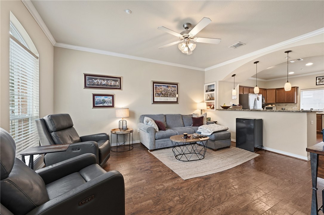 1198 Jones-Butler Road, Unit 2505 College Station, TX 77840 - Photo 2 of 13 a living room with furniture and kitchen view