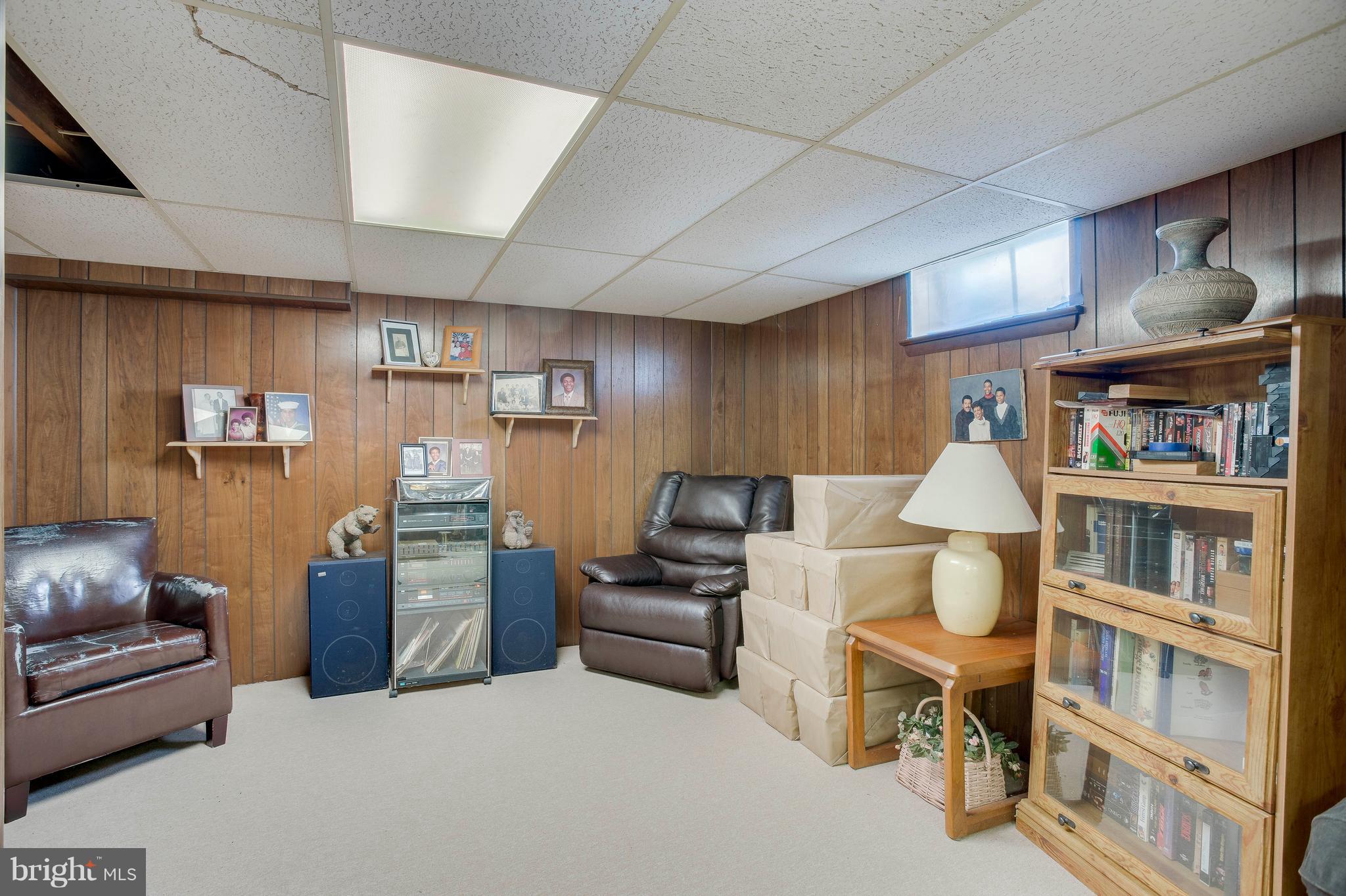 256 Candytuft Road Reisterstown, MD 21136 - Photo 33 of 37 a living room with furniture and a book shelf