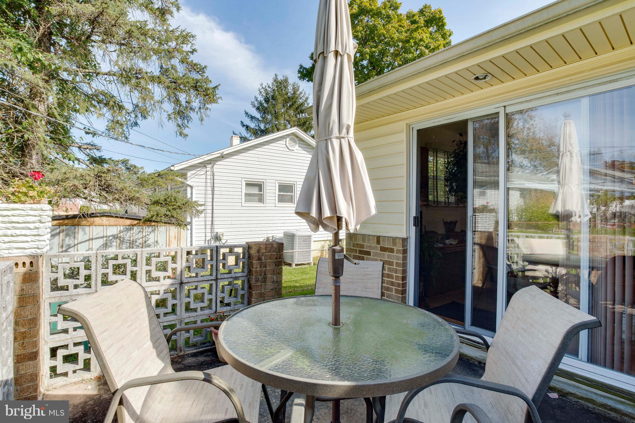 256 Candytuft Road Reisterstown, MD 21136 - Photo 36 of 37 a view of a patio with table and chairs