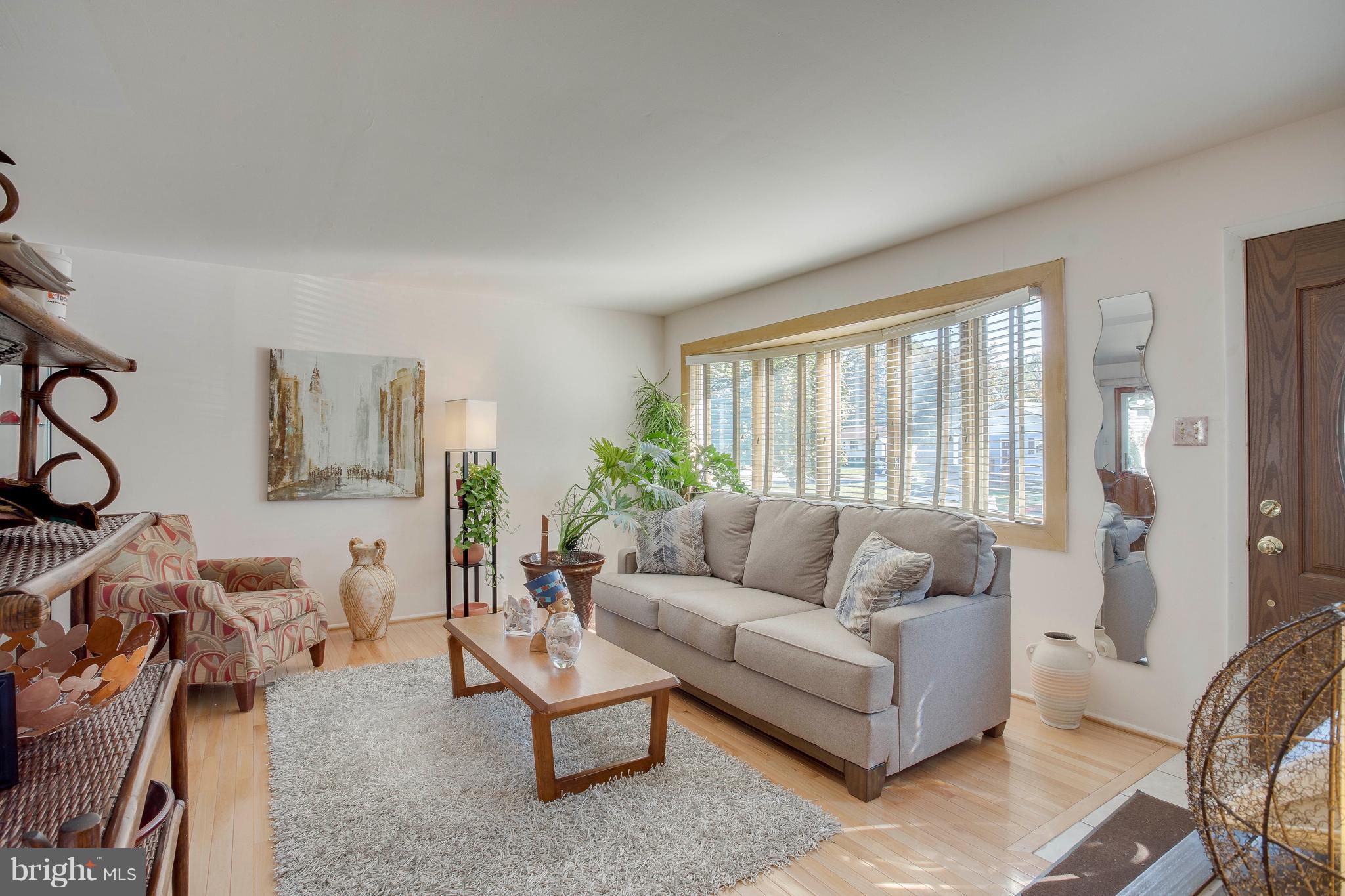 256 Candytuft Road Reisterstown, MD 21136 - Photo 5 of 37 a living room with furniture and a large window
