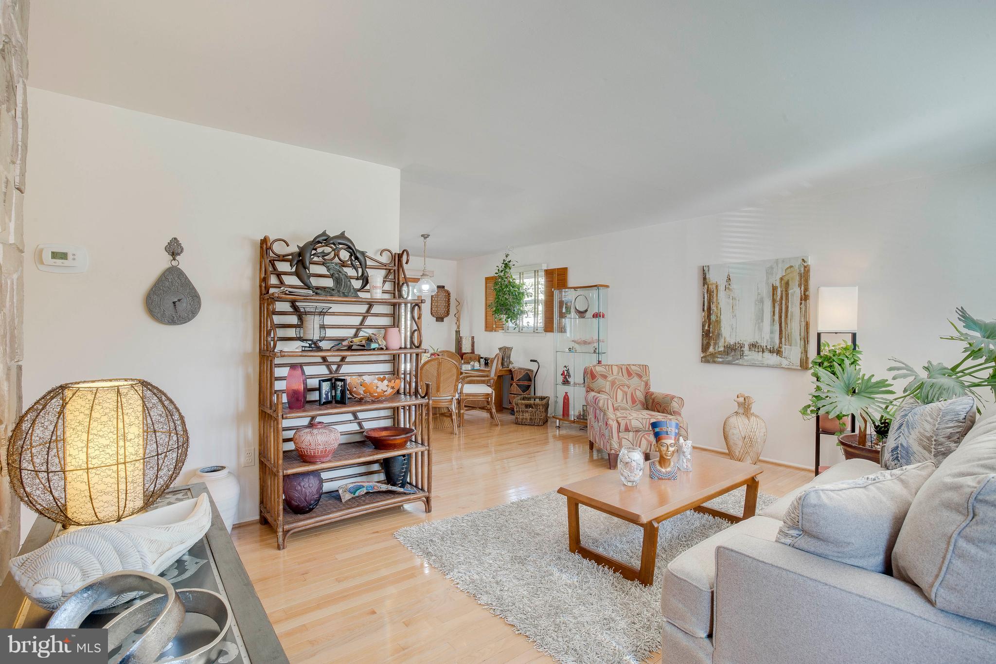 256 Candytuft Road Reisterstown, MD 21136 - Photo 8 of 37 a living room with furniture and a wooden floor