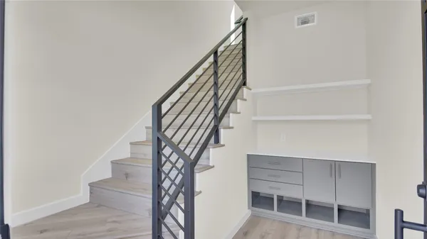 a view of entryway with stairs