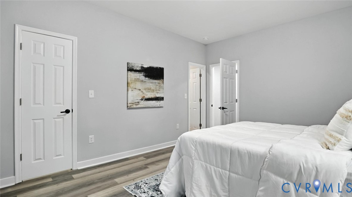 409 Mistletoe Street Petersburg, VA 23803 - Photo 19 of 40 a bedroom with a bed and a window