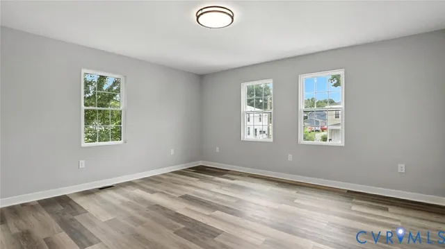 an empty room with windows