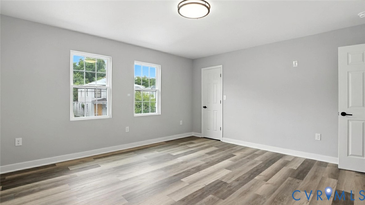 409 Mistletoe Street Petersburg, VA 23803 - Photo 27 of 40 a view of a room with wooden floor and window