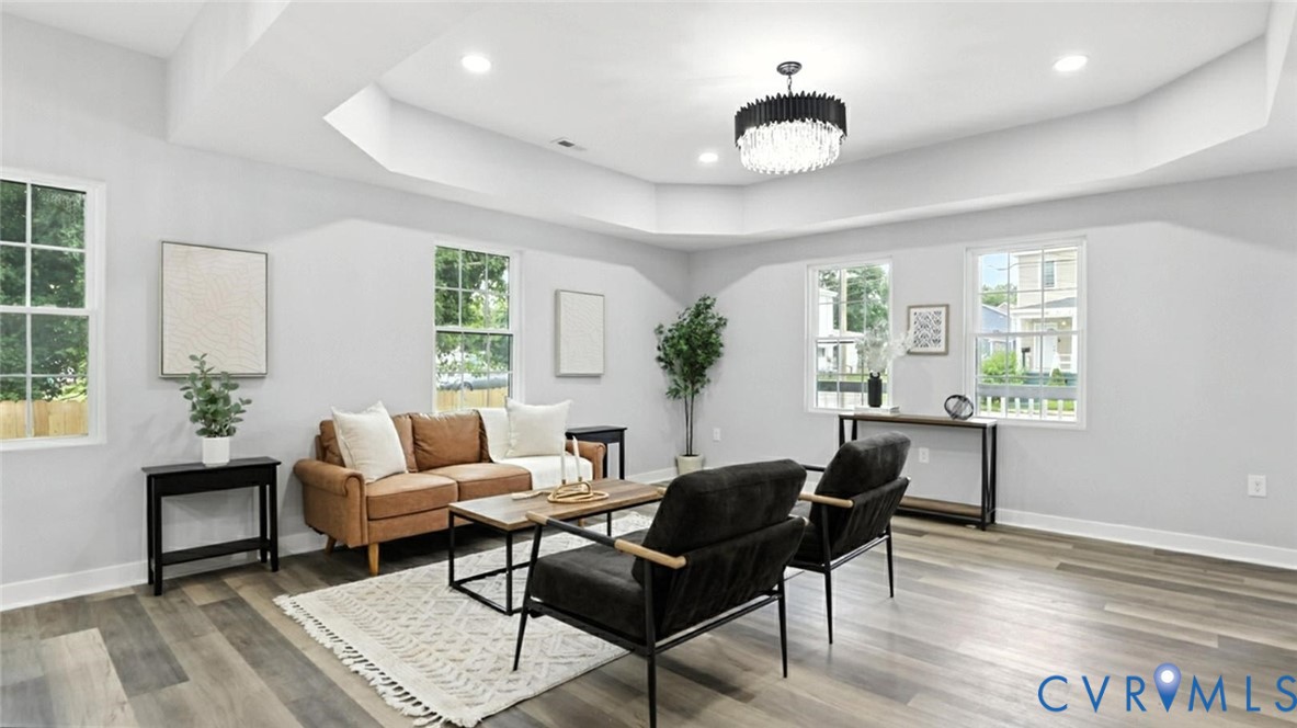 409 Mistletoe Street Petersburg, VA 23803 - Photo 8 of 40 a living room with furniture and a window