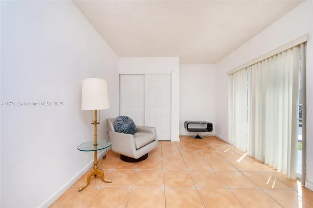 a view of a backyard with potted plants