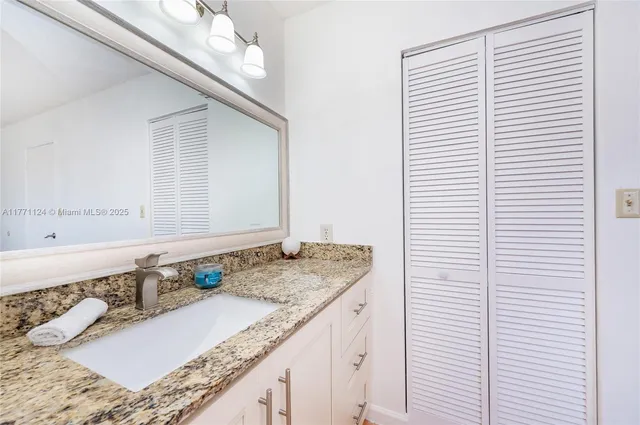 a bathroom with a sink a toilet and a bathtub