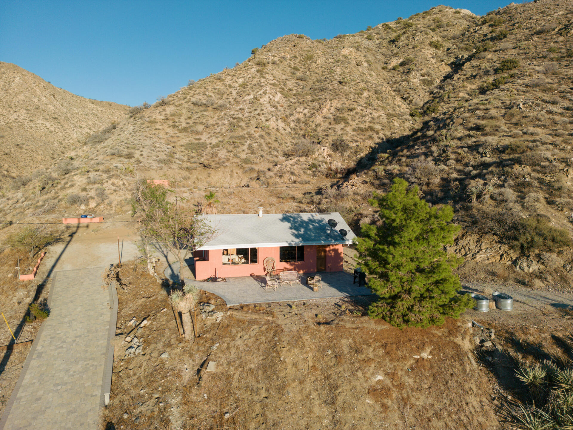 53019 Apache Trail Morongo Valley, CA 92256 - Photo 26 of 37 view of a large building with a mountain in the background