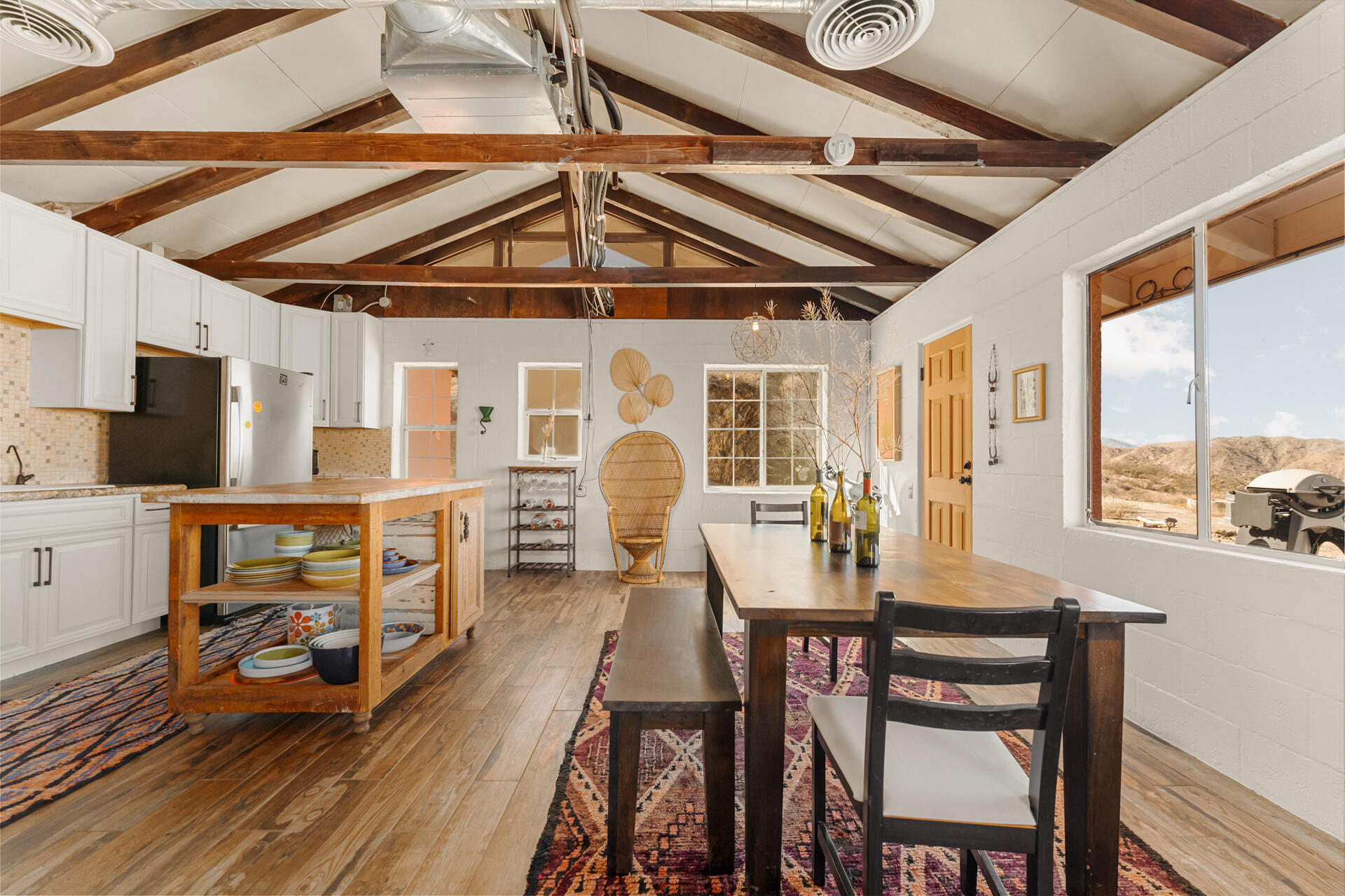 53019 Apache Trail Morongo Valley, CA 92256 - Photo 5 of 37 a view of a dining room with furniture window and wooden floor
