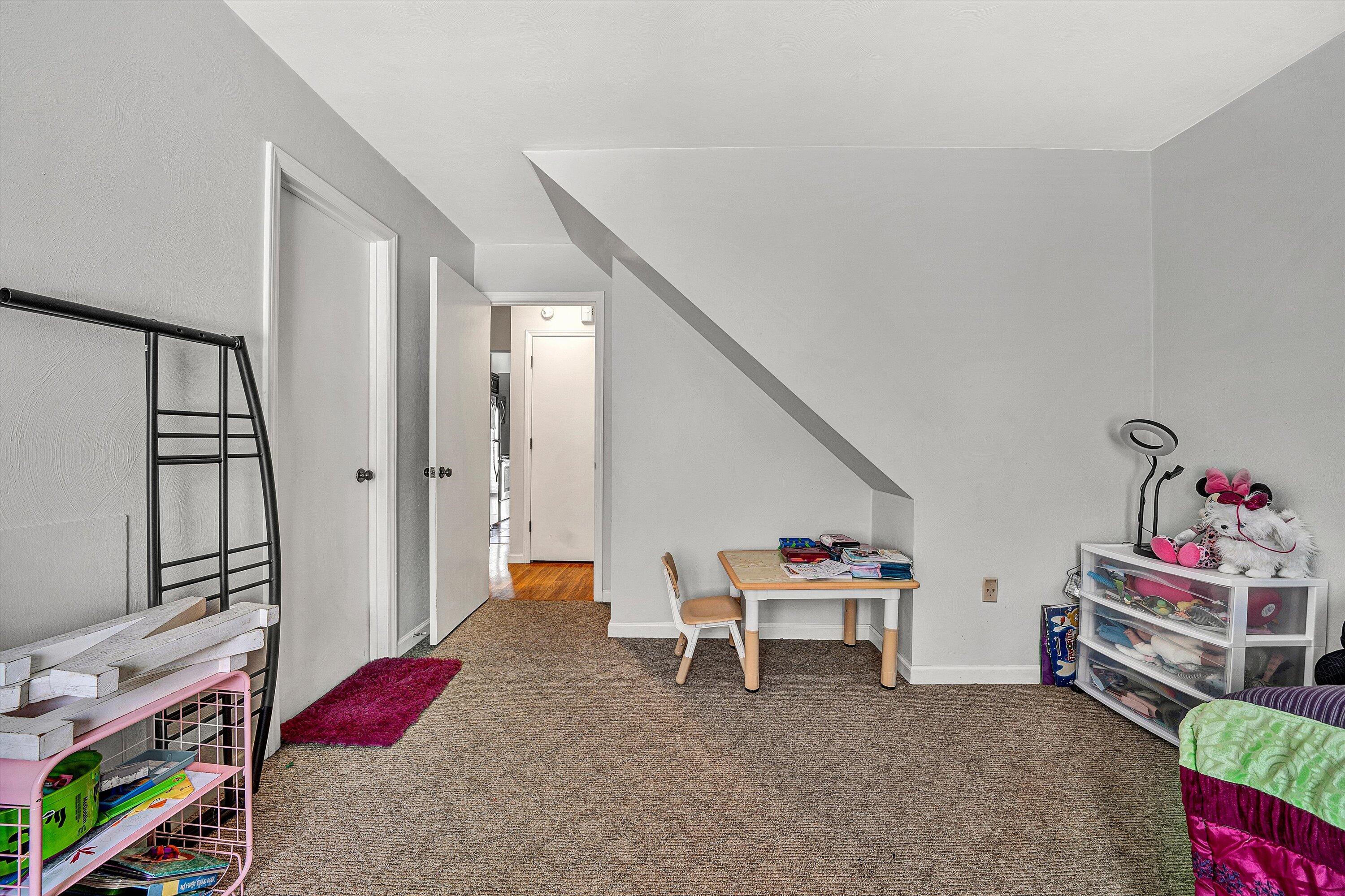 3309 Forest Ridge Road Roanoke, VA 24018 - Photo 11 of 18 a bedroom with furniture and a chair