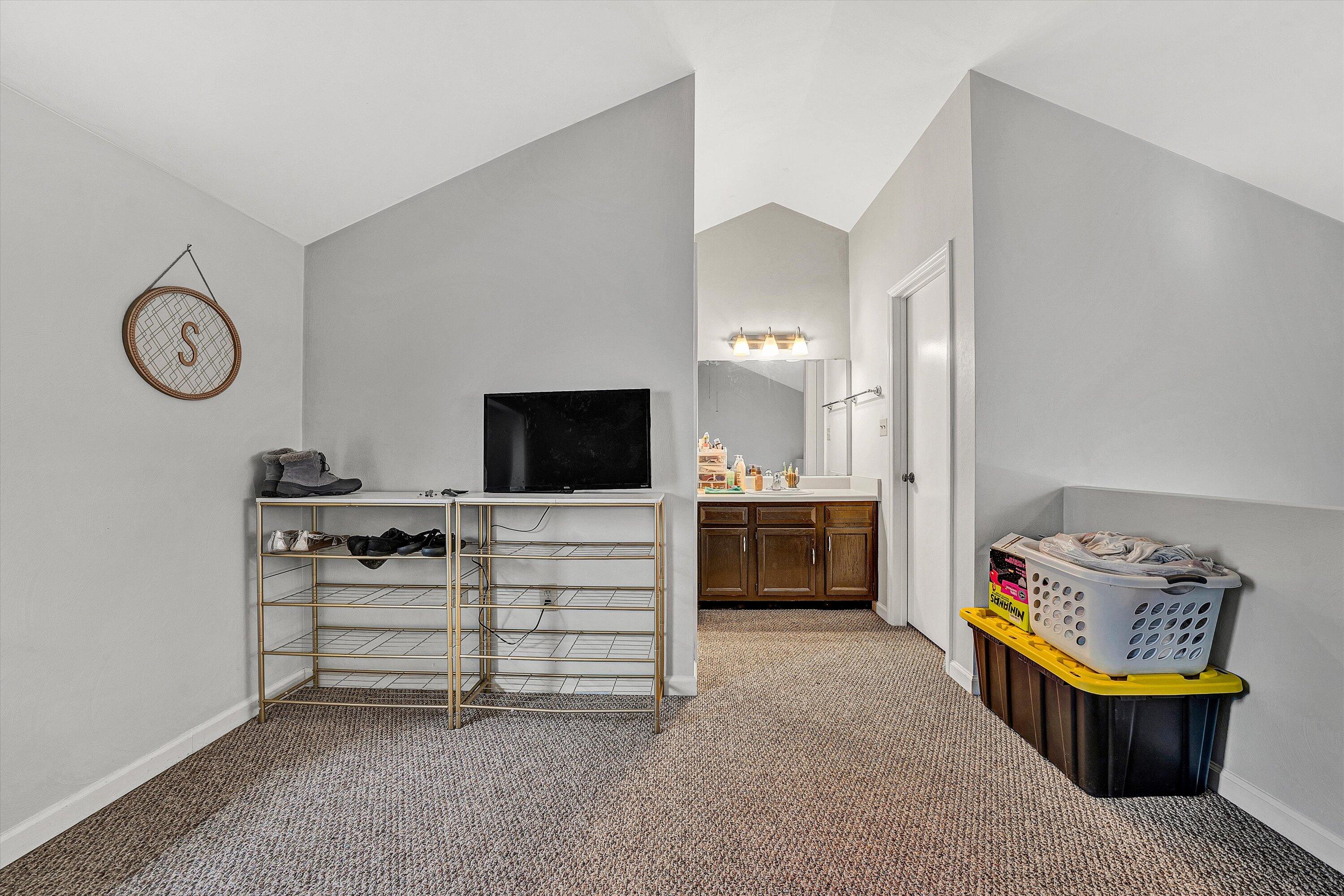 3309 Forest Ridge Road Roanoke, VA 24018 - Photo 14 of 18 a view of work space with furniture and a flat screen tv