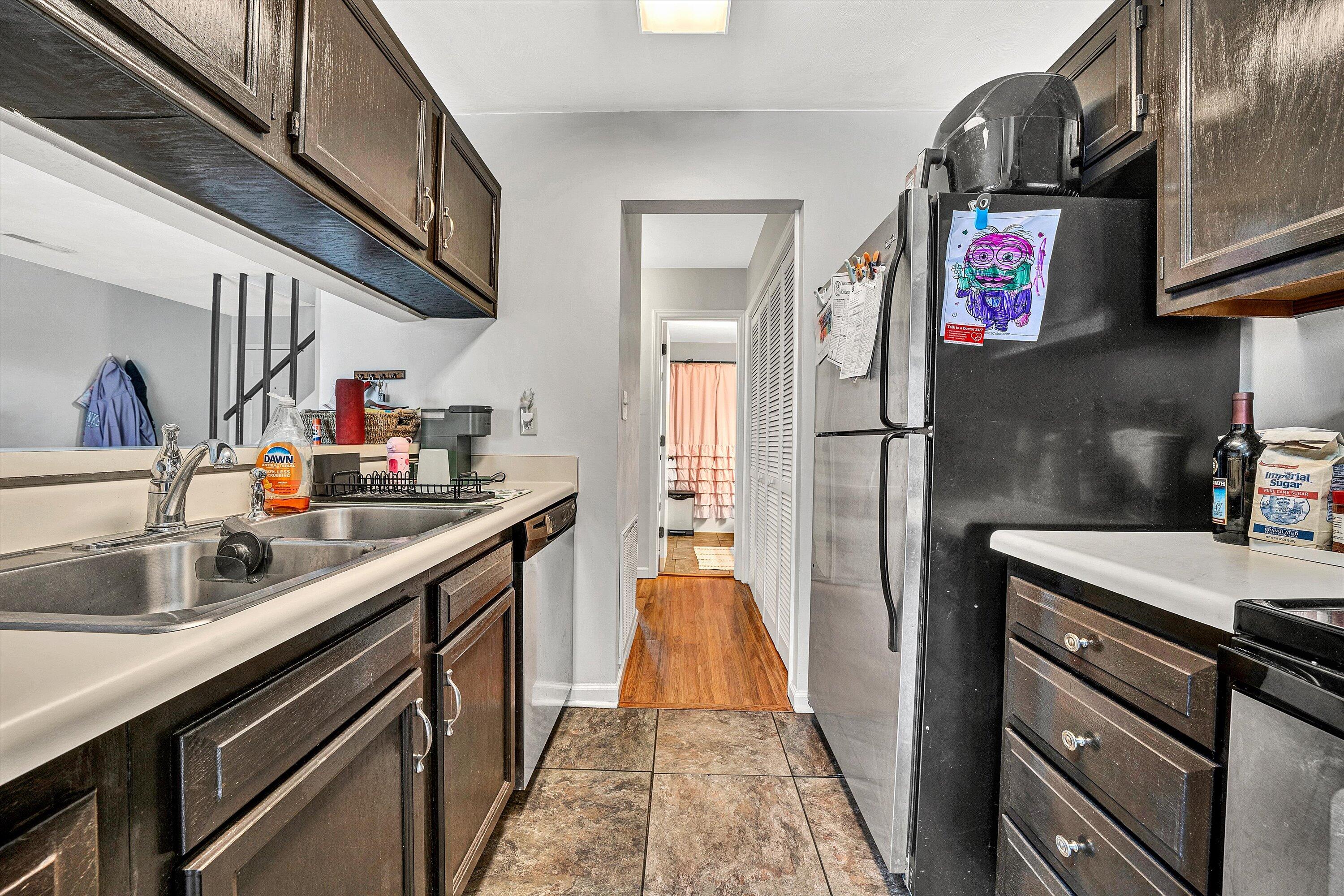 3309 Forest Ridge Road Roanoke, VA 24018 - Photo 8 of 18 a kitchen with stainless steel appliances granite countertop a refrigerator and a sink