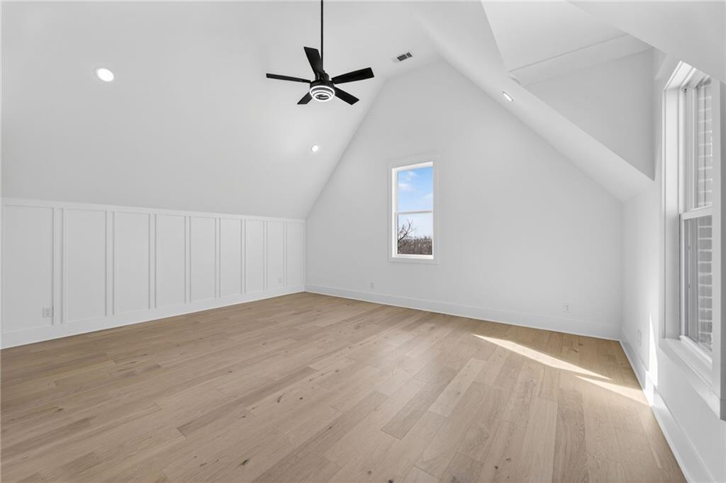 405 Thunder Road Buford, GA 30518 - Photo 79 of 104 wooden floor in an empty room with a window