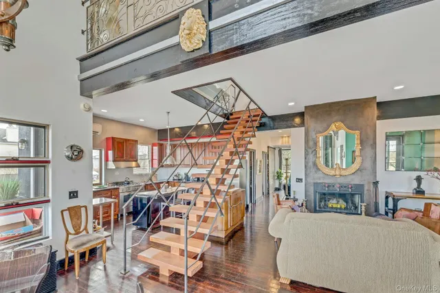 a view of a livingroom with furniture and a table