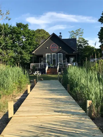 a view of swimming pool with a patio