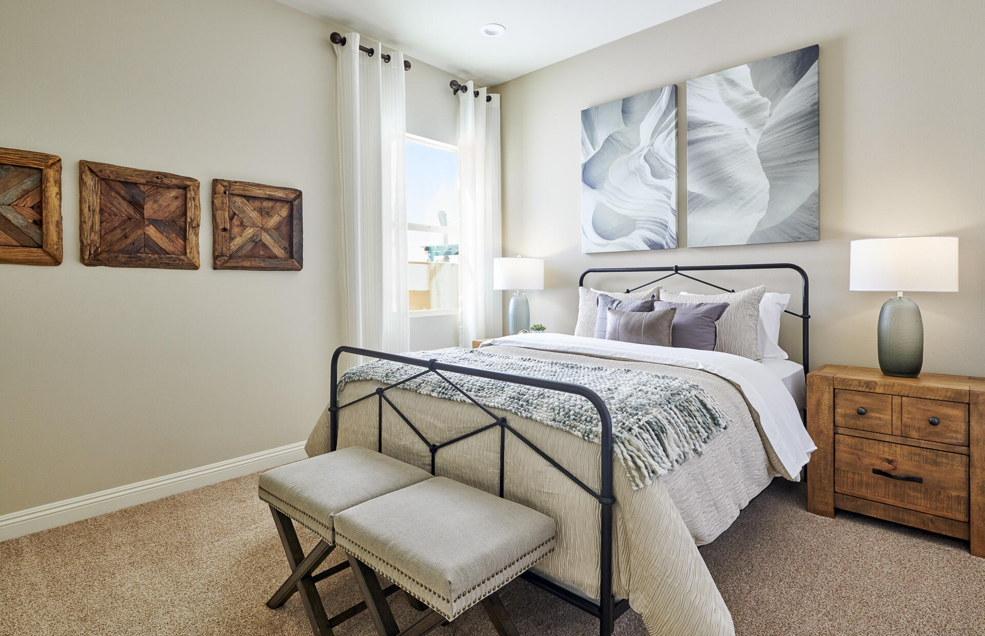 33 Zinfandel Rancho Mirage, CA 92270 - Photo 9 of 46 a bedroom with a bed and a painting on the wall