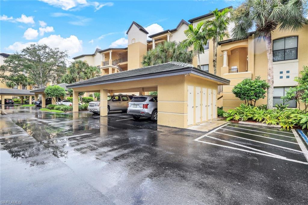 195 Vintage Circle, Unit E403 Naples, FL 34119 - Photo 27 of 39 a house view with a outdoor space