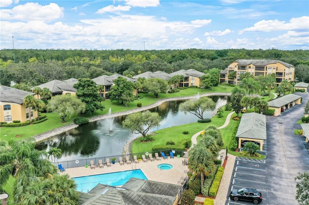 195 Vintage Circle, Unit E403 Naples, FL 34119 - Photo 33 of 39 an aerial view of multiple house