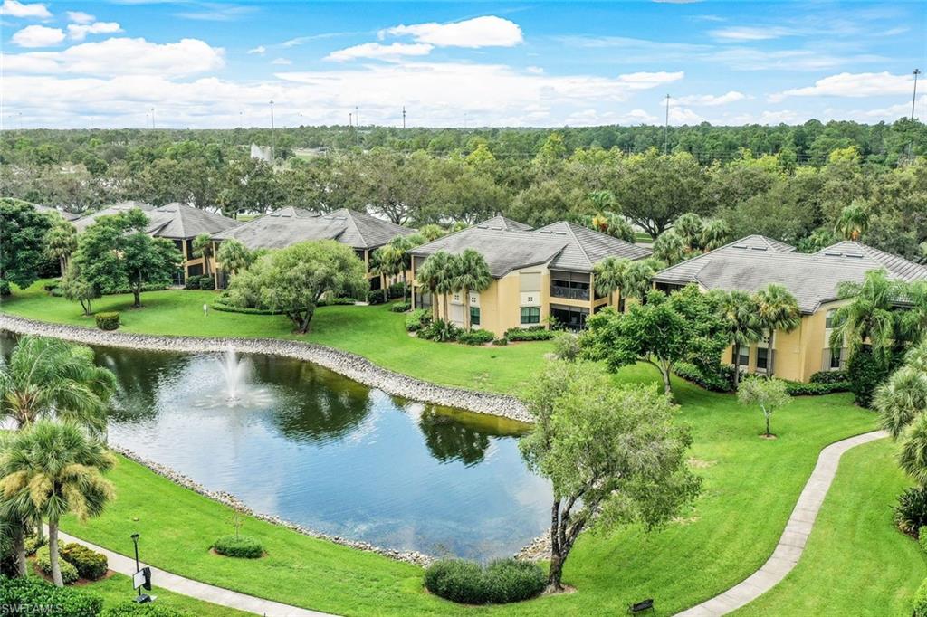 195 Vintage Circle, Unit E403 Naples, FL 34119 - Photo 35 of 39 an aerial view of a house