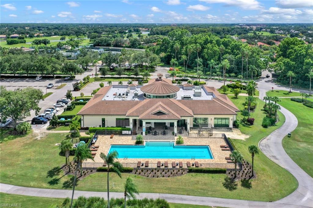 195 Vintage Circle, Unit E403 Naples, FL 34119 - Photo 39 of 39 a aerial view of a house with garden space and street view