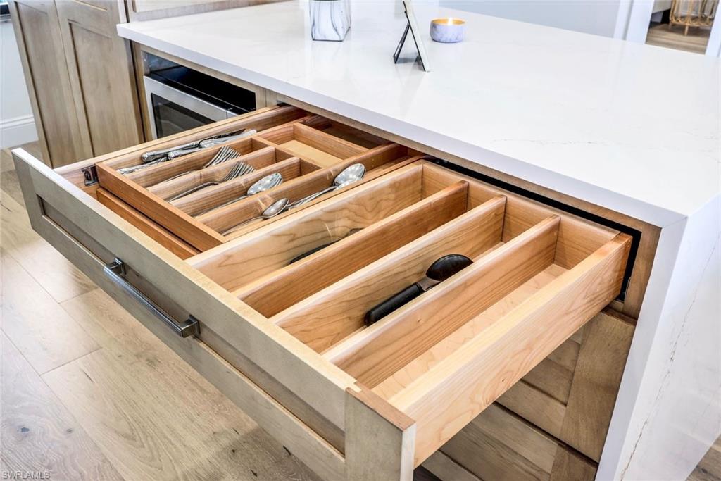 195 Vintage Circle, Unit E403 Naples, FL 34119 - Photo 6 of 39 a close up of a bed