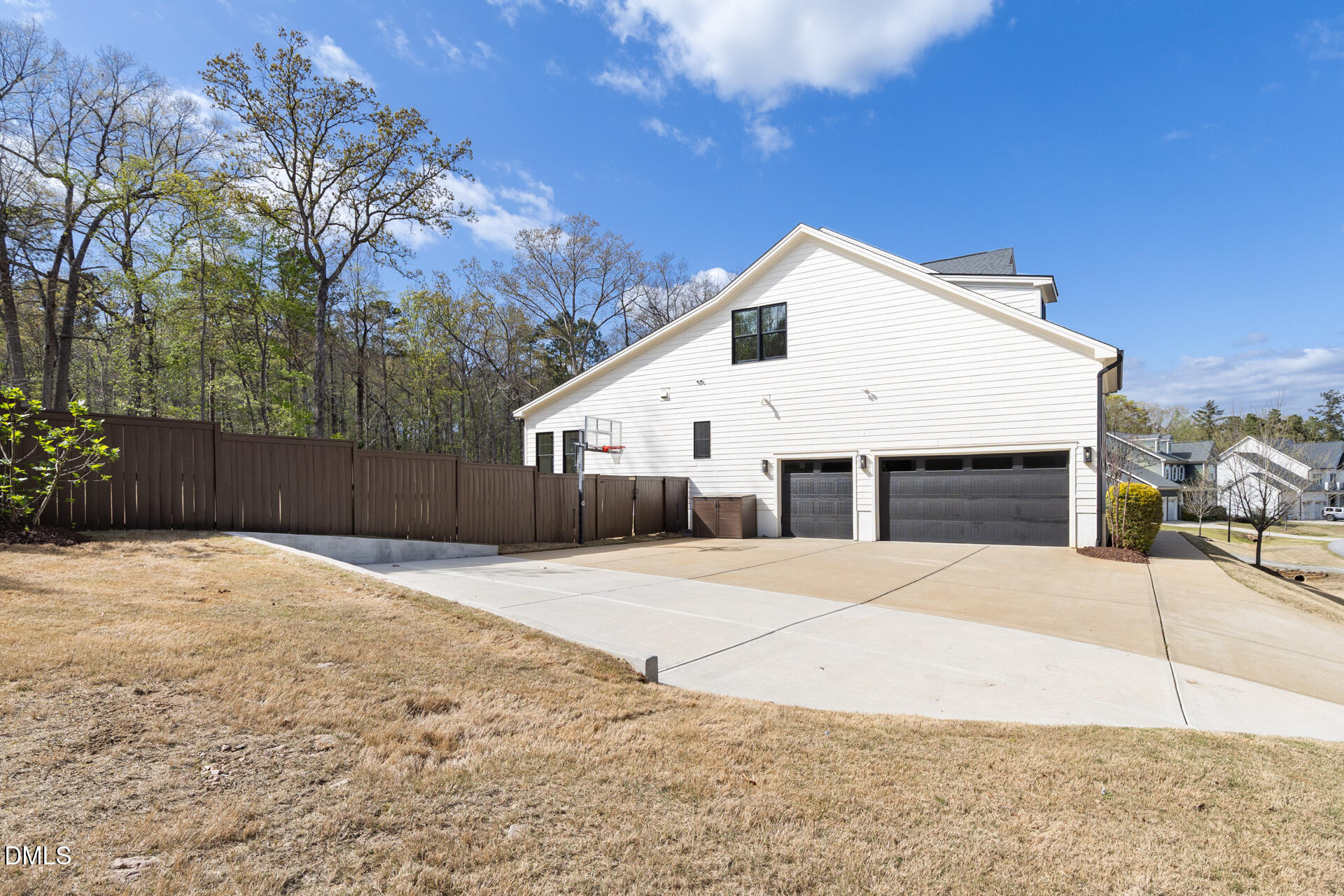 1117 Barley Stone Way Raleigh, NC 27603 - Photo 46 of 59 a white house with a large tree in front of it