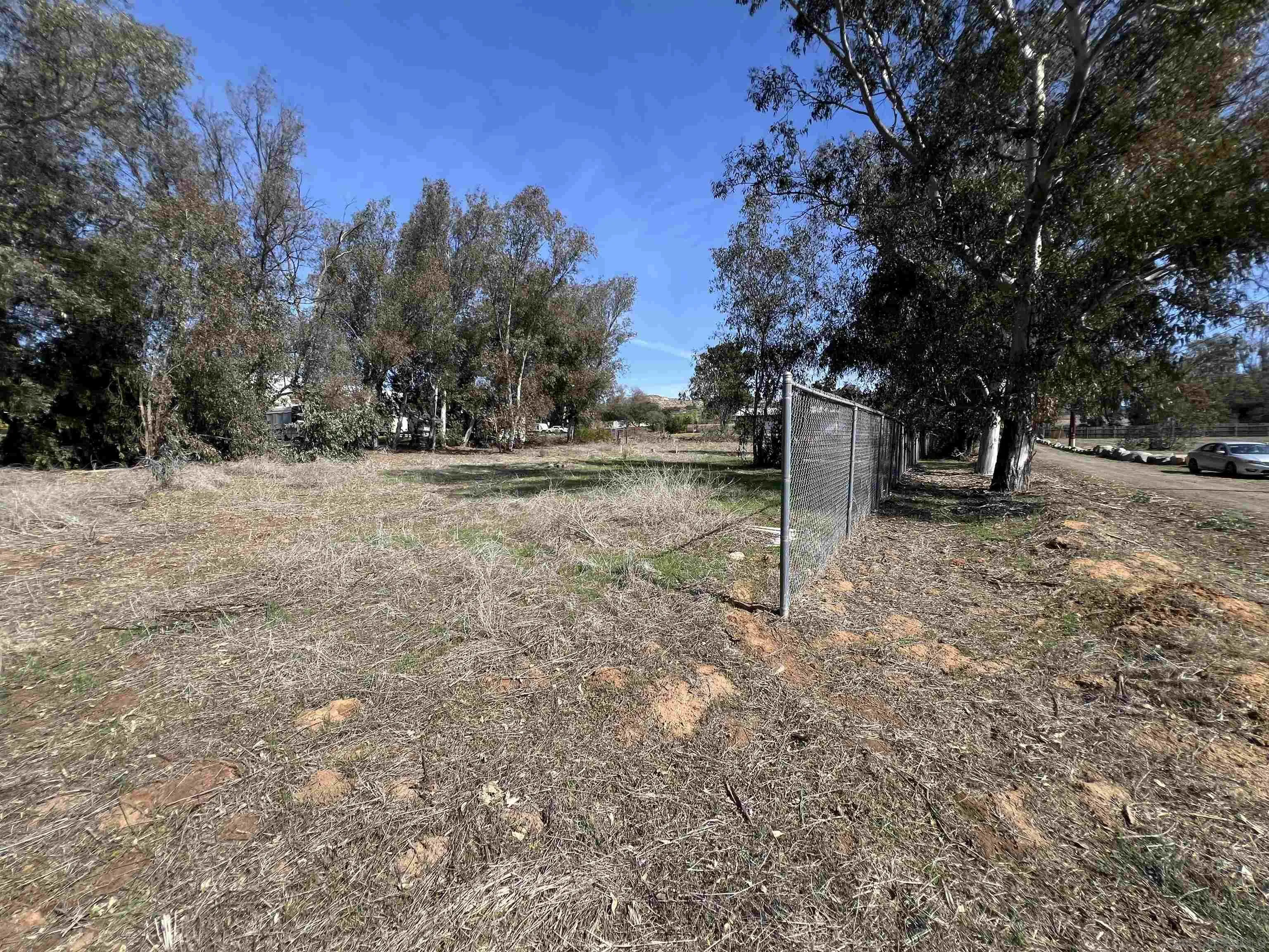 0 Country Club Drive Escondido, CA 92025 - Photo 8 of 16 a backyard of a house with lots of green space