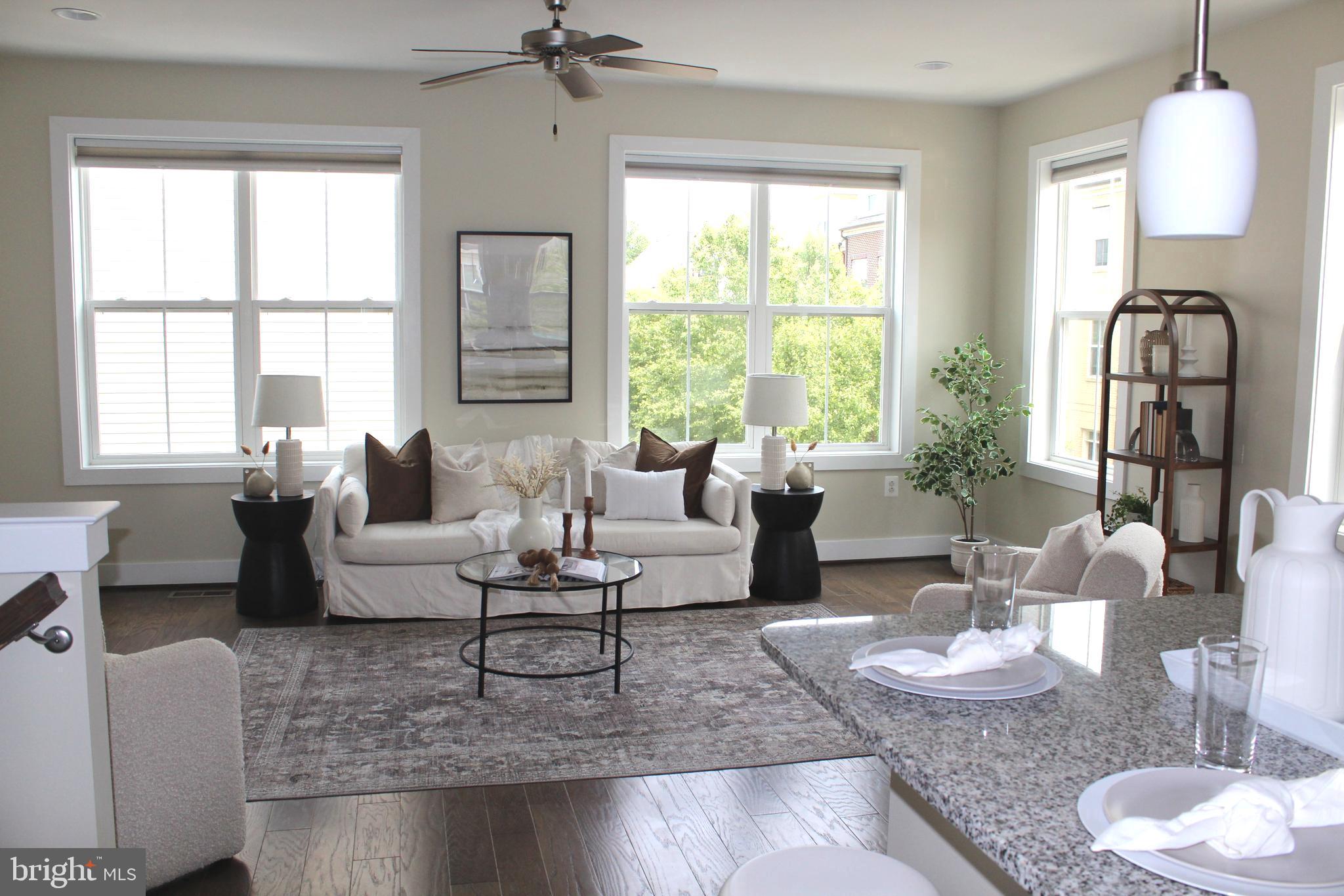 2411 Auden Drive Silver Spring, MD 20906 - Photo 1 of 45 a living room with furniture and a large window