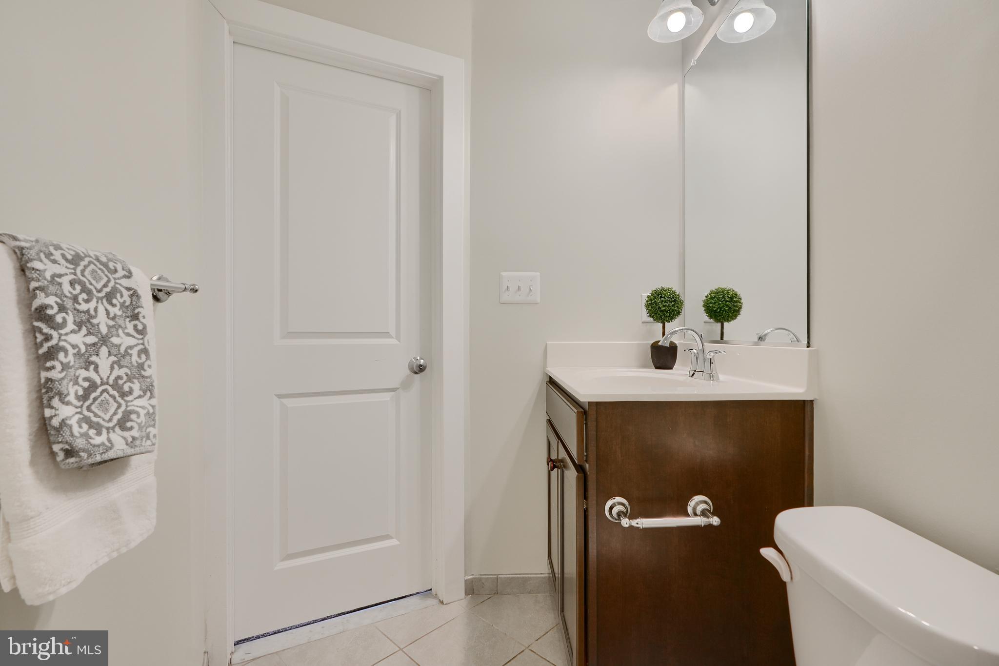 2411 Auden Drive Silver Spring, MD 20906 - Photo 11 of 45 a bathroom with a toilet and a sink