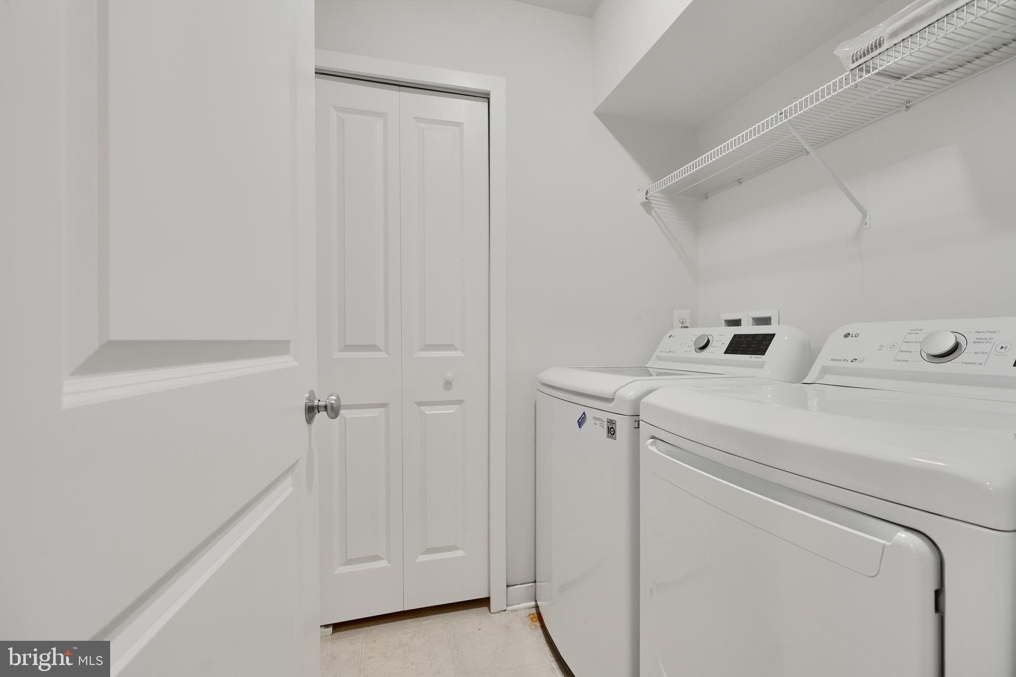 2411 Auden Drive Silver Spring, MD 20906 - Photo 27 of 45 a utility room with dryer and washer