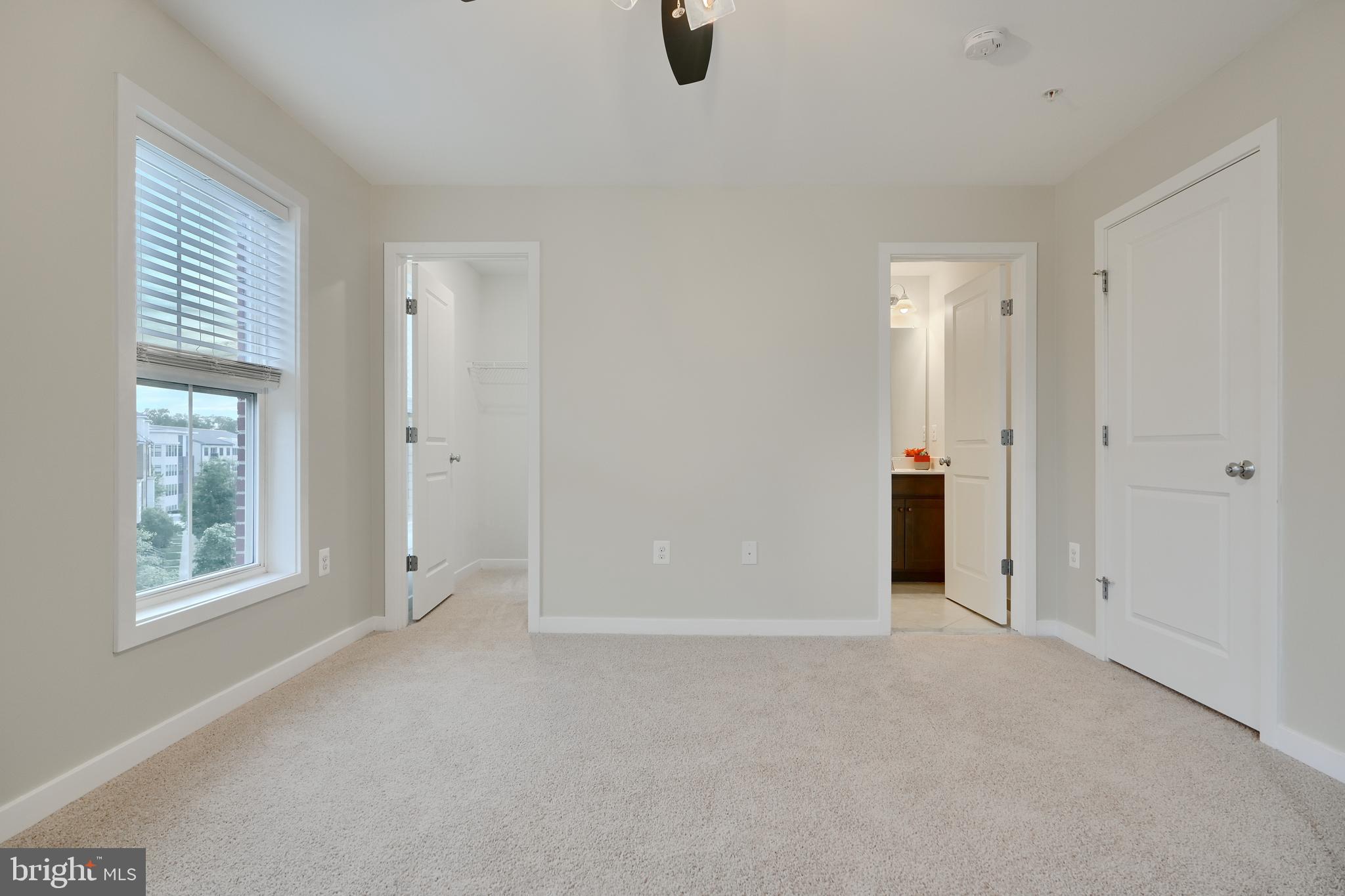 2411 Auden Drive Silver Spring, MD 20906 - Photo 38 of 45 an empty room with windows and closet
