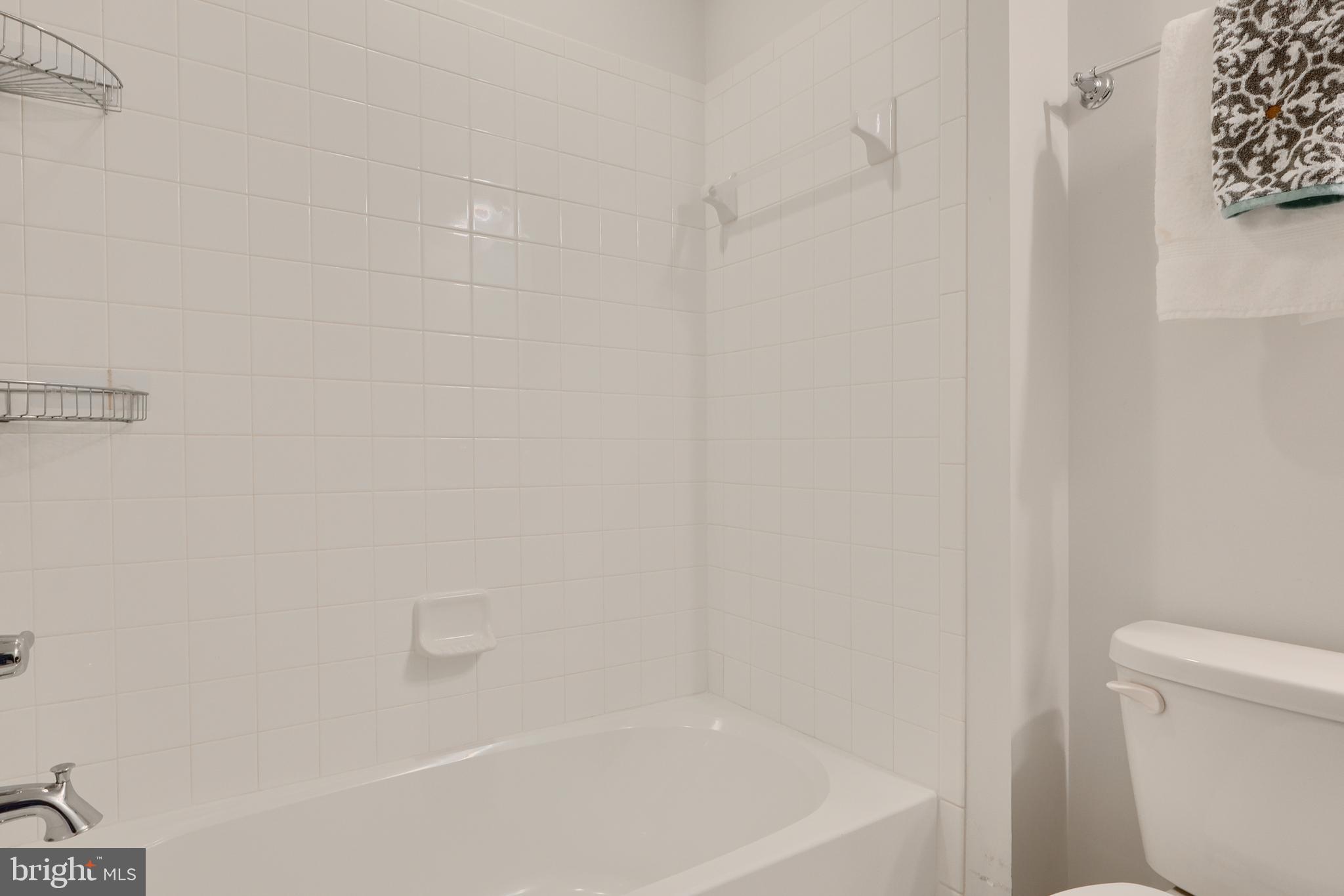 2411 Auden Drive Silver Spring, MD 20906 - Photo 40 of 45 a close up of a bathtub curtain