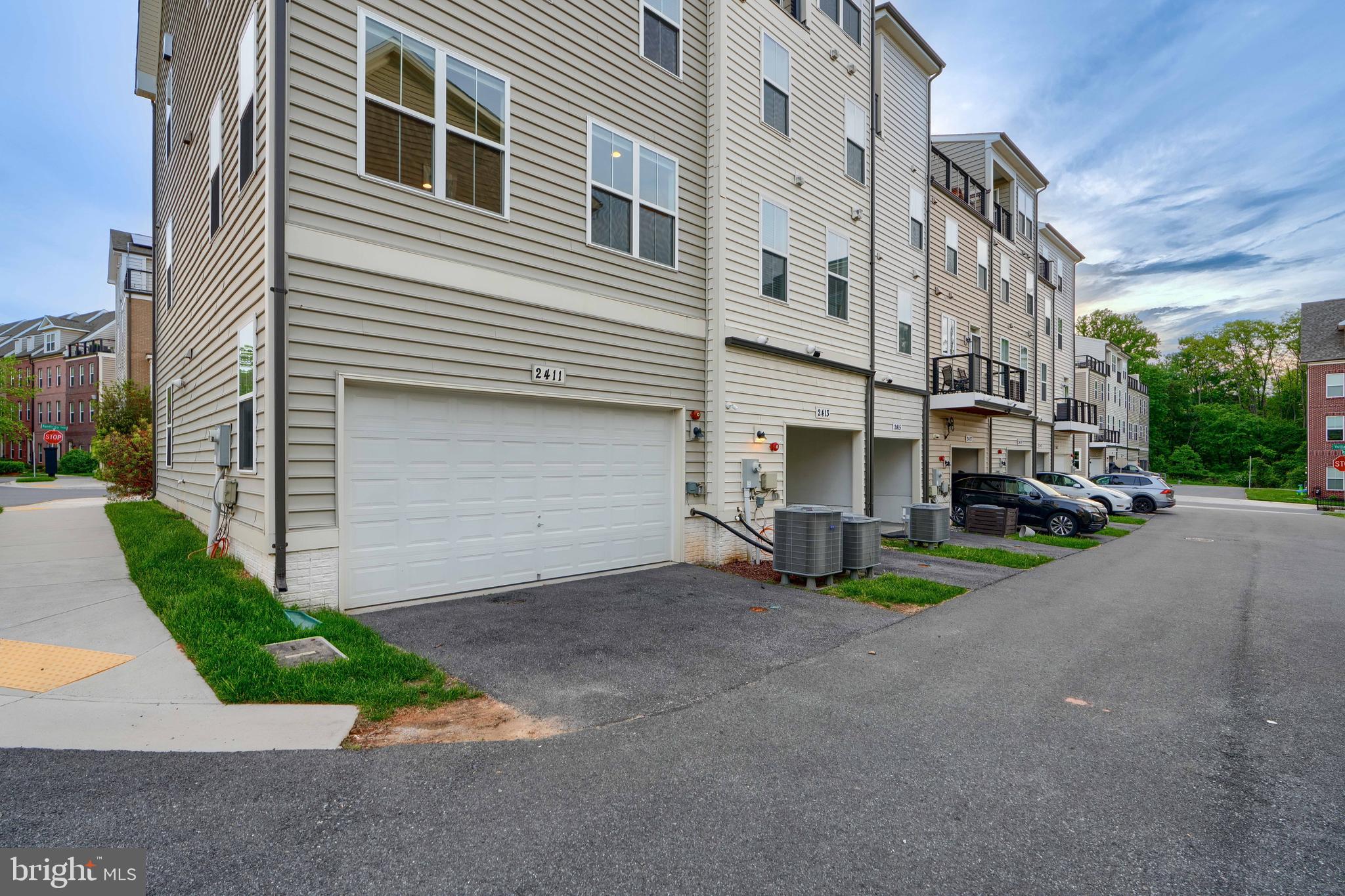 2411 Auden Drive Silver Spring, MD 20906 - Photo 44 of 45 a view of a street with brick building in front of it