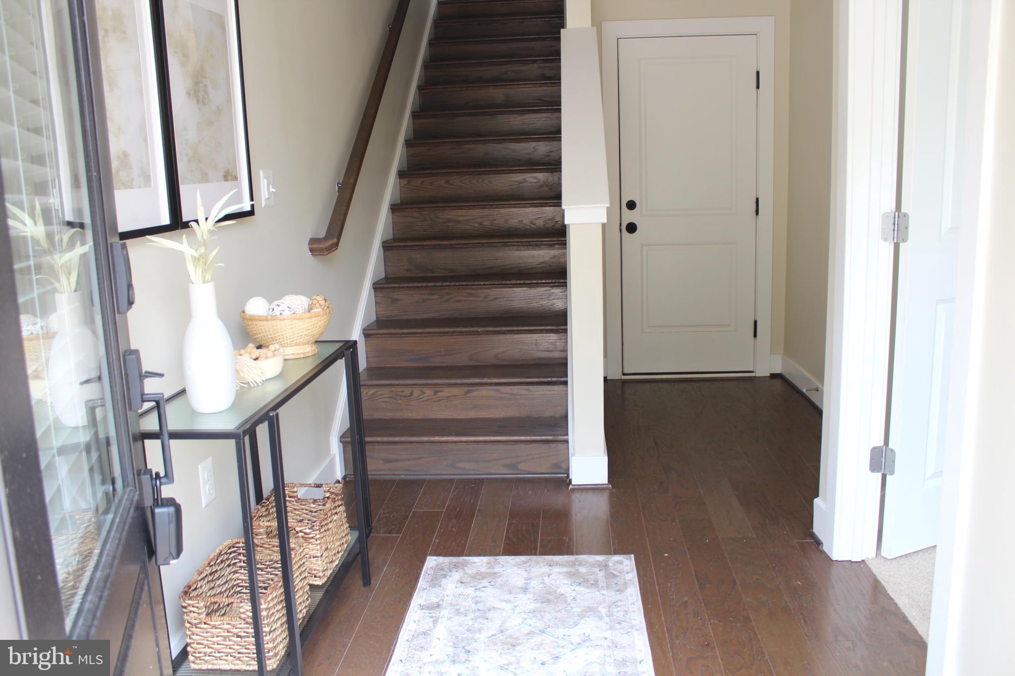 2411 Auden Drive Silver Spring, MD 20906 - Photo 5 of 45 a view of entryway and hall with wooden floor