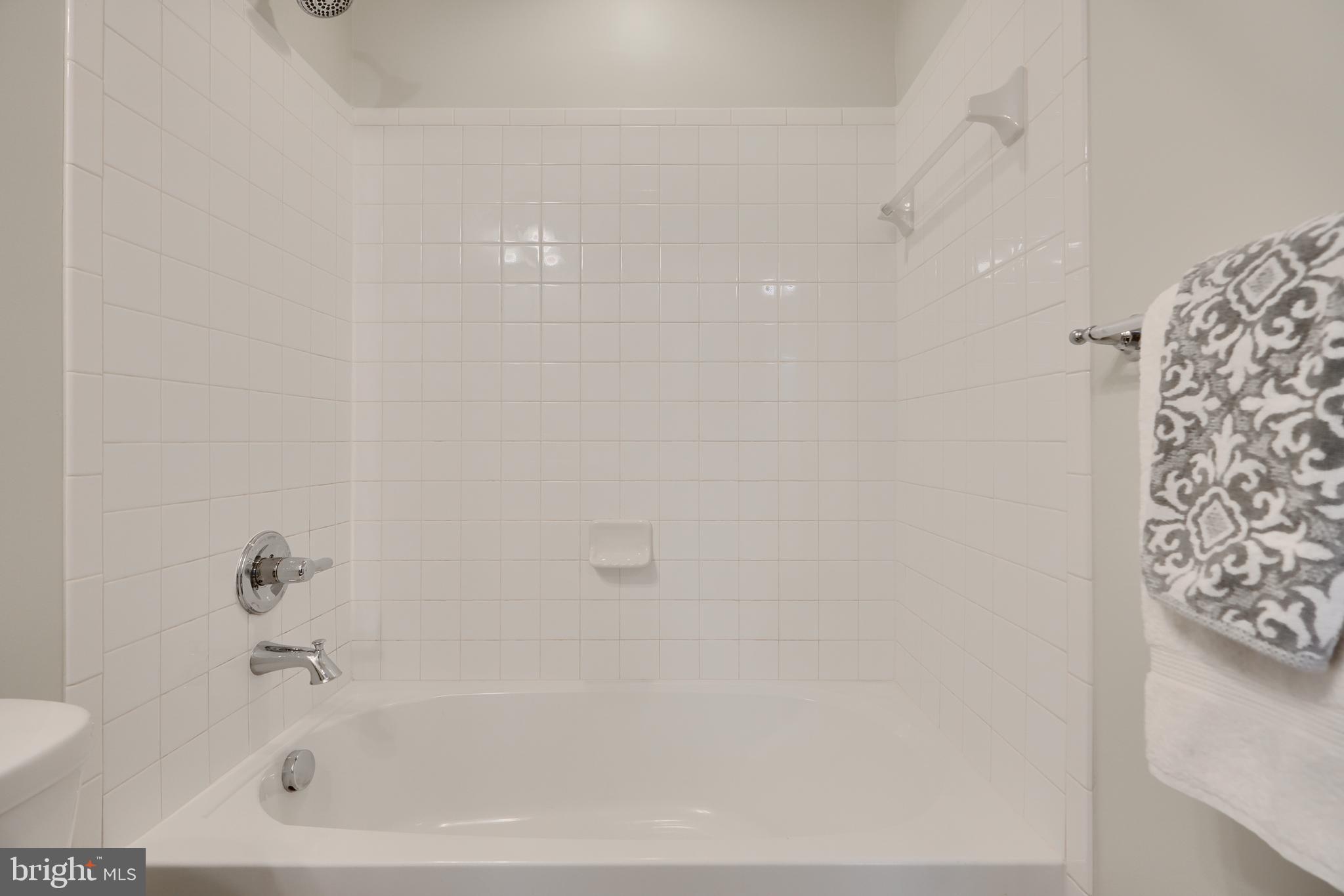 2411 Auden Drive Silver Spring, MD 20906 - Photo 10 of 45 a bathroom with a bathtub