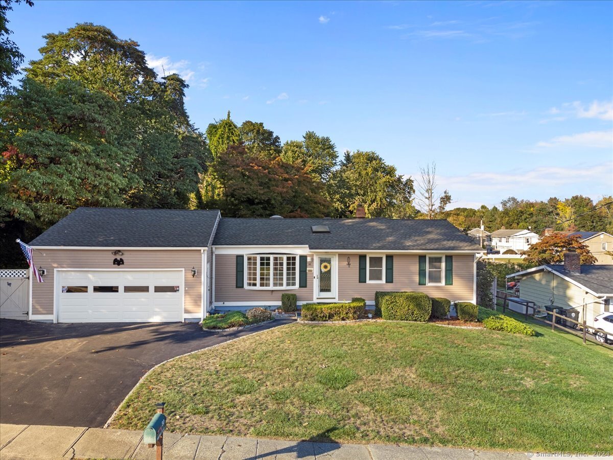 30 Wayne Road Milford, CT 06460 - Photo 1 of 1 a front view of a house with a yard