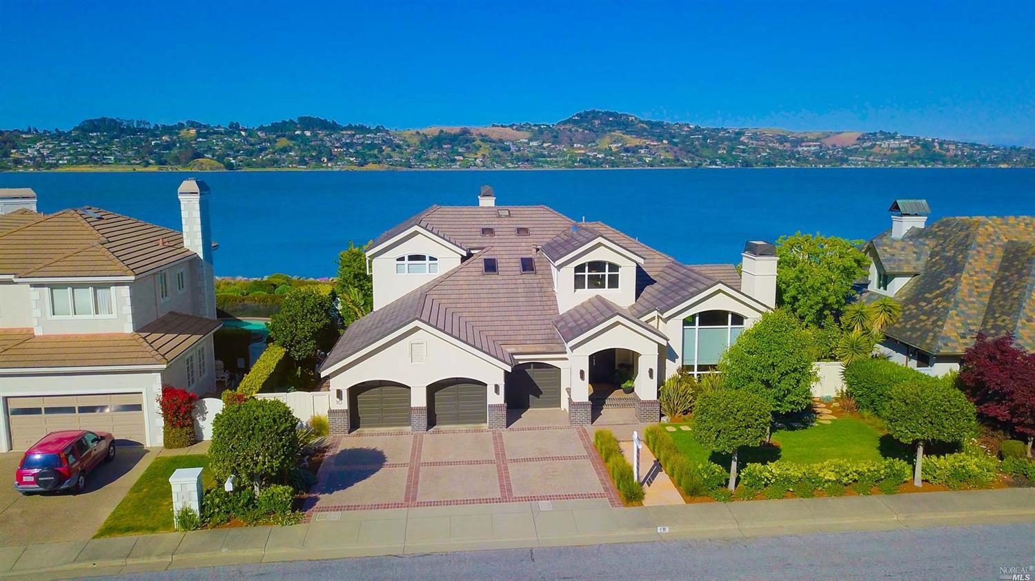 a view of a house with a garden and entryway