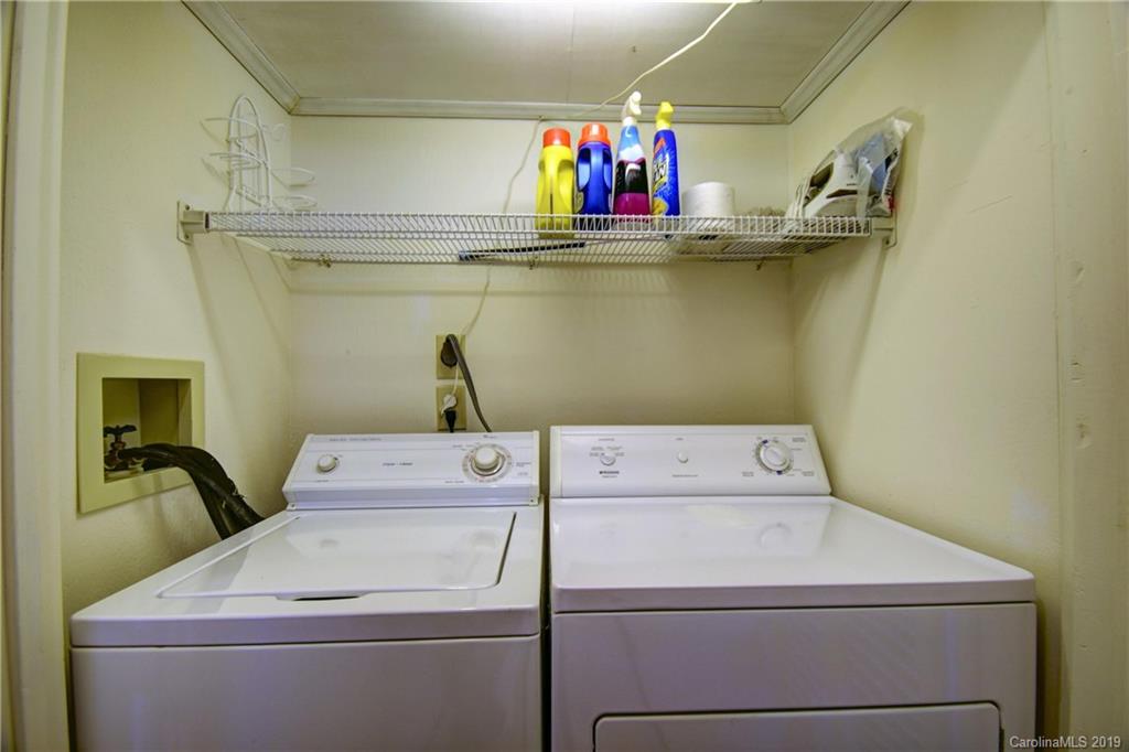 318 Stoney Ridge Loop Maggie Valley, NC 28751 - Photo 14 of 25 a utility room with dryer and washer
