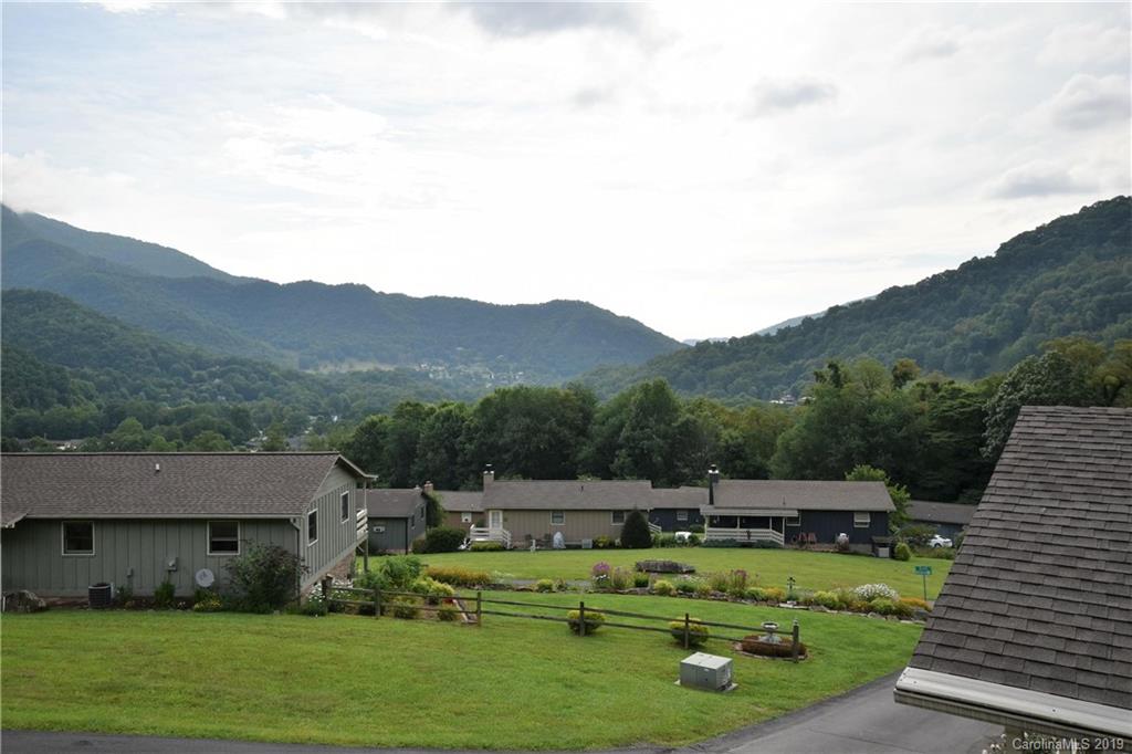 318 Stoney Ridge Loop Maggie Valley, NC 28751 - Photo 4 of 25 a view of a house with outdoor space