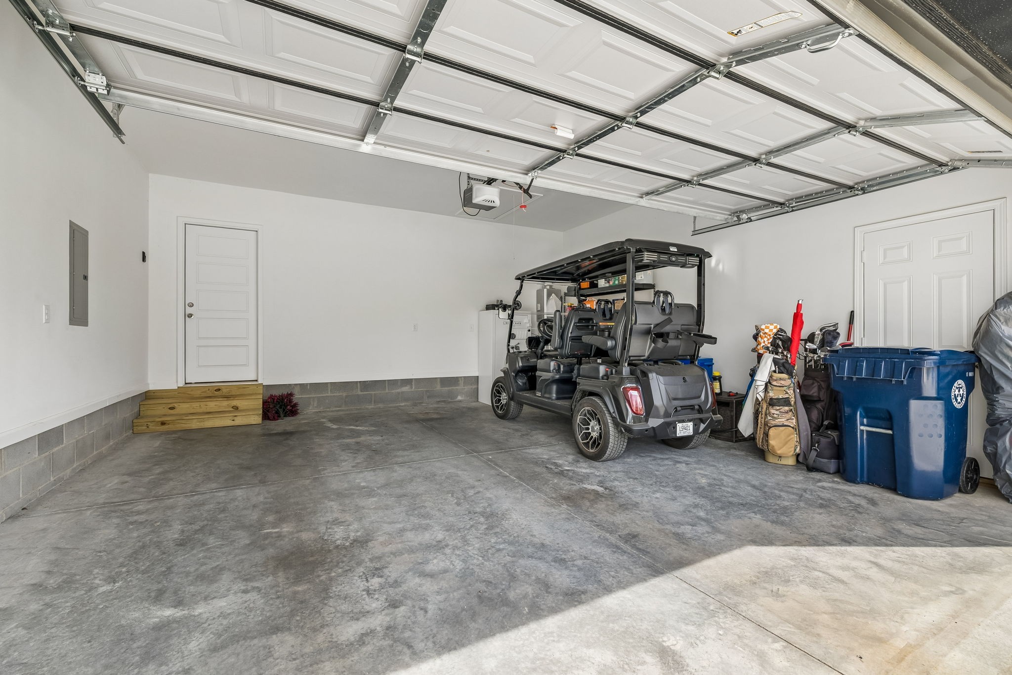 180 Vickers Hill Road Smithville, TN 37166 - Photo 27 of 33 a view of a garage with a bike and wooden roof