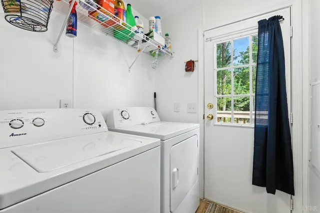 a view of backyard with deck and outdoor seating